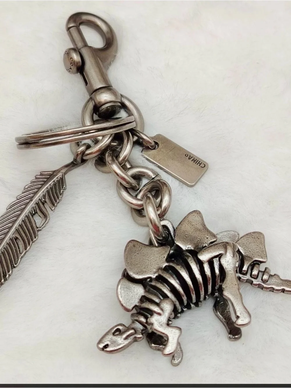 Coach Silver-Tone Steggy Stegosaurus & Feather Keyring/bag charm Like new
